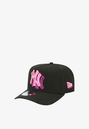 Black cap with a curved brim and an embroidered pink New York logo on the front. Features a fitted design and a small side logo.