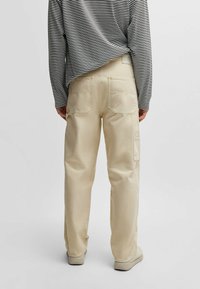 HUGO GETRO251D - Jeans straight leg - beige nine