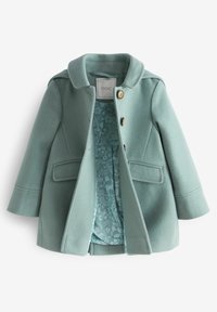 Manteau en laine vert menthe avec un col structuré, deux poches avant et deux boutons. Doublure à motif floral en bleu clair.