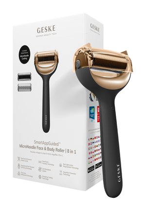 Rouleur pour visage et corps GESKE MicroNeedle avec poignée noire et tête de rouleau dorée, présenté avec emballage et deux accessoires supplémentaires.