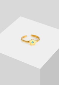 Zlatni podesivi prsten s dizajnom cvijeta i svijetloplavim dragim kamenom u središtu. Glatka površina, jednostavan i elegantan.
