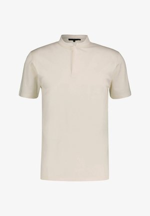 Polo de manga corta en color crema, con cuello mao y tapeta con dos botones, confeccionado en una tela suave y con textura.