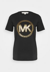 Svart bomullströja med kortärmar som har en guldpaljetterad "MK"-logotyp innesluten i en rund design. Slät textur och klassisk passform.