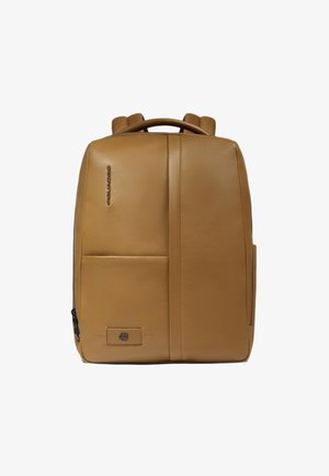 Brown leather backpack with a smooth texture, featuring a front pocket, two top handles, and a zip closure on the side.