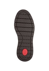 Semelle de chaussure noire avec motif géométrique, taille 37 indiquée, et une étiquette ovale rouge portant la mention "Tamaris COMFORT" près du talon.