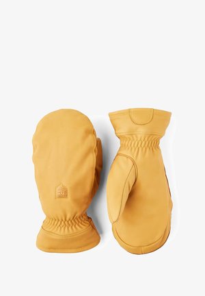 Par af lysebrune lædervotter med elastiske håndled og et lille logo præget på bagsiden af den ene votte mod en hvid baggrund.