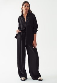 CALLI CUPRO - Camicia - black