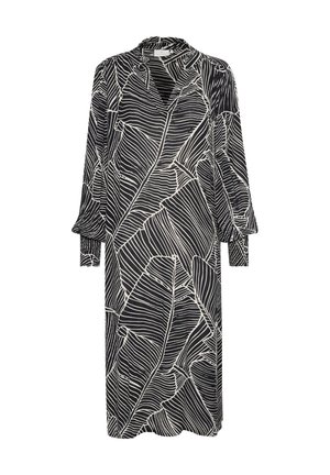 Czarna sukienka z białym wzorem liści, z długimi rękawami z mankietami, wysokim kołnierzem i luźnym krojem. Tkanina ma gładką fakturę.