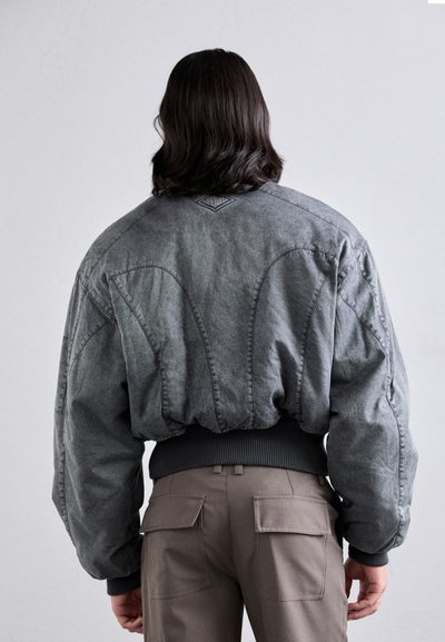 Han Kjøbenhavn WASHED PADDED JACKET - Μπουφάν τύπου bomber - black