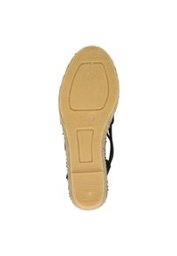 Sandalo espadrilles nero con una fascia in juta testurizzata e suola in gomma. La suola è color marrone chiaro con motivi rigati per una migliore aderenza.