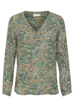 Långärmad blus på en khaki-bakgrund prydd med gröna och vita paisleymönster. V-ringad design med en lös passform.