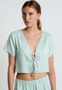 NOVIA - Haut de pyjama - light green