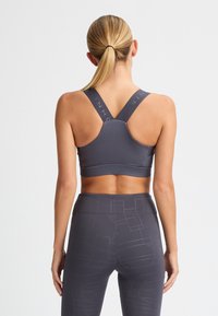 Röhnisch KAY - Urheiluliivit: keskitason tuki - dk grey plum
