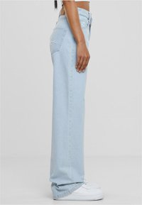 Karl Kani Jeans Relaxed Fit - denimblue