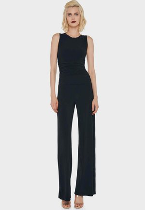 Norma Kamali, TUTA SHIRRED ARRICCIATA NERA - Jumpsuit - nero