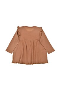 Brown, ribbed dress featuring long sleeves, a round neckline, ruffled shoulder accents, and a flared hem with a wavy edge.