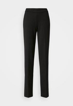 Pantalon noir à jambe droite avec une taille élastique. Fabriqué à partir d'un tissu texturé sans motifs ni matériels visibles. Design épuré et minimal.
