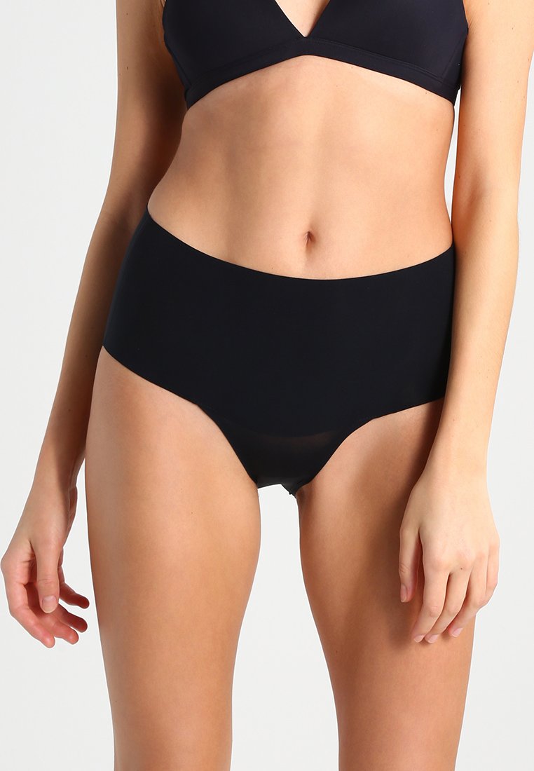 High-waisted black underwear made of smooth fabric. Features a seamless design and a wide waistband for comfort.