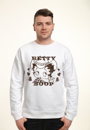 Weißes Sweatshirt mit einem braunen Druckdesign von Betty Boop, verziert mit Herzen und karierten Akzenten. Rippbündchen an den Ärmeln und am Saum.