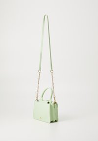 Green leather handbag with a structured shape, short top handles, and a detachable chain strap. Features gold-tone hardware.