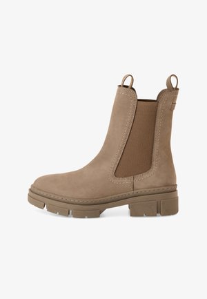 Stivale Chelsea in suede beige con pannello elastico laterale, punta arrotondata e suola in gomma con battistrada testurizzato. Linguette su ciascun lato per una facile calzata.