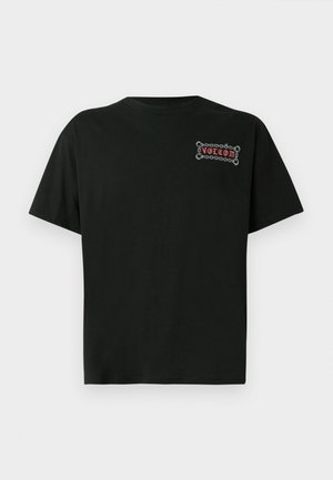 Black cotton t-shirt with short sleeves, featuring a graphic "VOLCOM" logo in a decorative frame on the left chest.