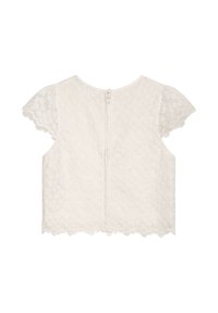 Weißes Spitzenoberteil mit kurzen Flatterärmeln, wellenförmigen Kanten und einer Rückenknopfleiste mit Blumenmuster. Weicher, strukturierter Stoff.