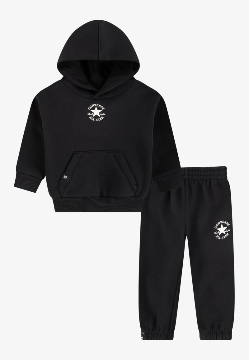 Black hoodie and sweatpants set made of soft fabric. Hoodie features a kangaroo pocket and a white logo. Pants have elastic cuffs and waistband.
