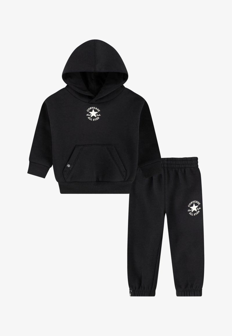 Black hoodie and sweatpants set made of soft fabric. Hoodie features a kangaroo pocket and a white logo. Pants have elastic cuffs and waistband.