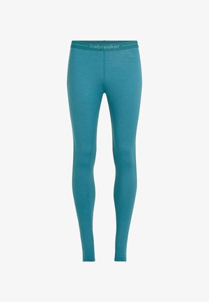 Teal leggings made from a soft, stretchy fabric. Features a fitted design and a waistband with "icebreaker" logo in contrasting color.