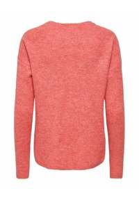 Pull en maille corail à coupe décontractée, avec une texture côtelée et un col rond. Manches longues et ourlet légèrement arrondi complètent le design.