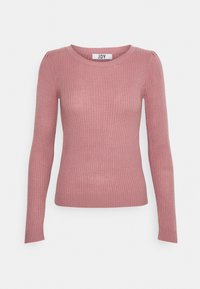 Pull côtelé rose à manches longues avec un col rond et une coupe ajustée. Texture douce et tissu légèrement extensible. Étiquette de la marque visible.