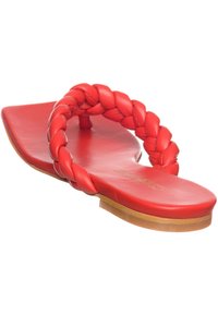 Rode leren flip-flops met een gevlochten band, platte zool en afgeronde neus. Soepele textuur met een subtiele glans en een lichtbruine buitenzool.