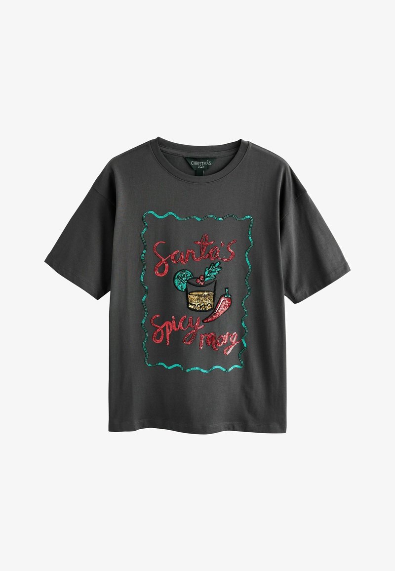 Dark gray t-shirt with a loose fit. Features a colorful, sequined graphic that reads "Santa's Spicy Mary" and includes decorative elements.