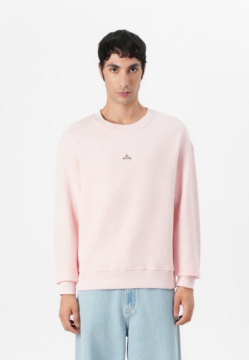 Holzweiler Sweater roze
