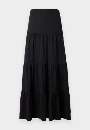 Black maxi skirt made of soft fabric, featuring a tiered design with an elastic waistband and ruffled accents at the hem.