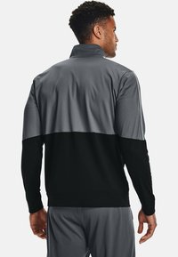 Under Armour TRACK - Verryttelytakki - grey