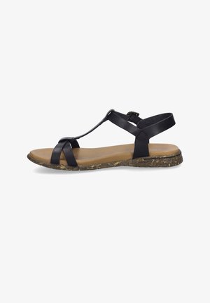 Sandale en cuir noir avec des brides croisées et une boucle à la cheville, dotée d'une semelle intérieure beige clair et d'une semelle extérieure marron texturée.