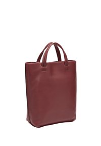 Sac fourre-tout en cuir bordeaux avec double poignée, forme rectangulaire, texture lisse et design minimaliste. Aucune quincaillerie ou ornement visible.