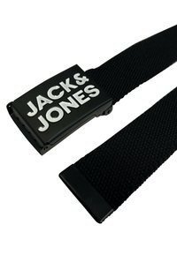 Black woven fabric belt featuring a metallic buckle with “JACK & JONES” in raised white lettering. The belt has a smooth rubber end.