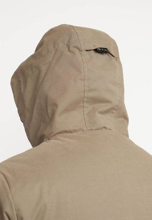 Brown hooded jacket with a smooth texture and adjustable toggle at the back of the hood, showing seam details and a clean, minimalist design.