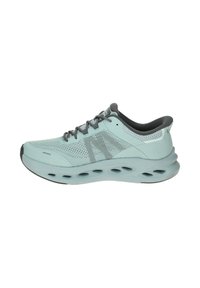 Light blue athletic shoe with mesh upper, gray accents, and a cushioned sole featuring oval cutouts for ventilation and flexibility.