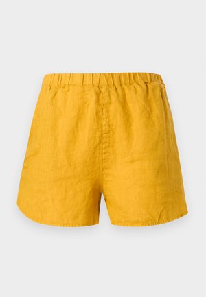 Yellow elastic waist linen shorts with a loose fit and simple design, shown front-facing on a plain white background.