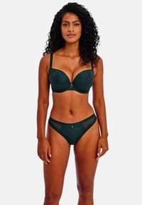 Dunkelgrünes Lingerie-Set mit einem gepolsterten BH im geometrischen Muster und dünnen Trägern, kombiniert mit passendem Unterwäsche im Bikini-Schnitt.