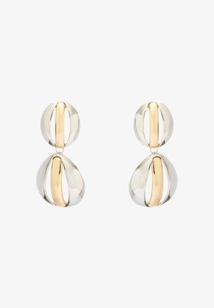 Hopea- ja kultametalliset korvakorut, joissa on ontto, tipan muotoinen muotoilu, jossa on toisiinsa kytkeytyviä elementtejä ja kiillotettu pinta.