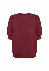 Maroon lyhythihainen paita, jossa on ribbaatut hihansuut, puffihihat ja pyöreä kaula-aukko, esitelty takaa valkoista taustaa vasten.