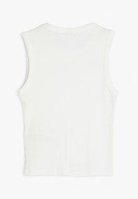 Top sans manches blanc en tissu côtelé, avec un col rond et une silhouette ajustée. Aucun motif ou élément de quincaillerie visible.