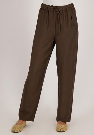Bruine, lichte, wijde broek met een elastische tailleband en een trekkoord. Textuurstof met een gladde uitstraling.