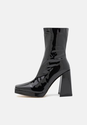 Bottines à talons hauts - black