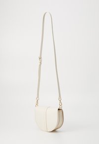 Tommy Hilfiger HERITAGE SADDLE - Cross body bag - beige
